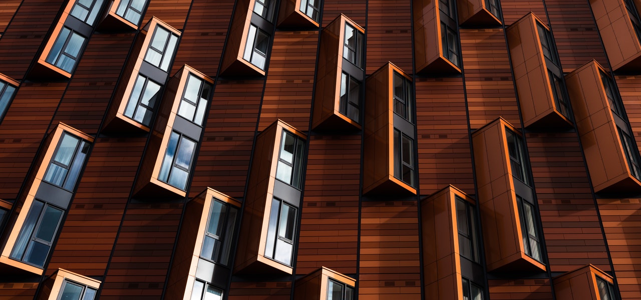 Architecture - Modern windows on a wooden-like facade